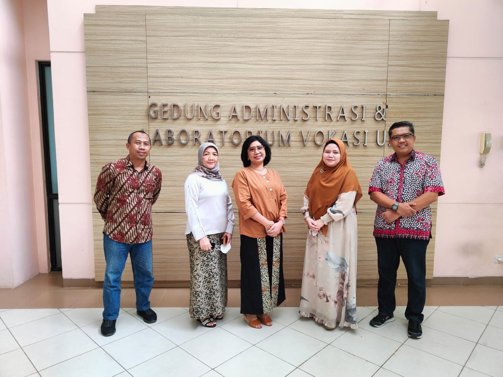 Group photo of event attendees indoors.